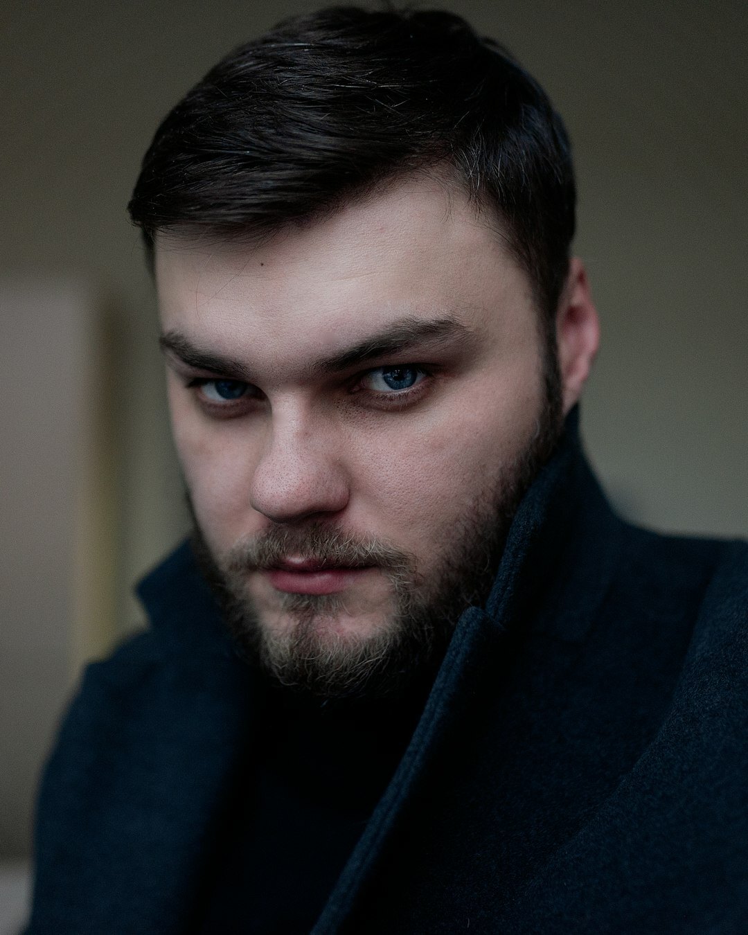 Studio portrait of a confident middle aged European man in a shirt